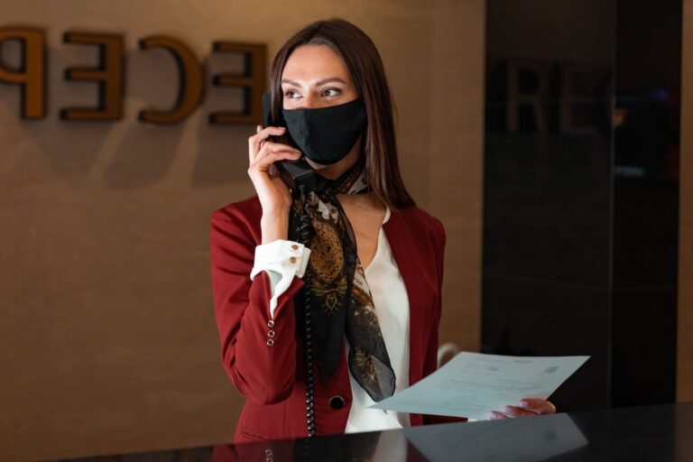 Dental front desk receptionist answering the phone