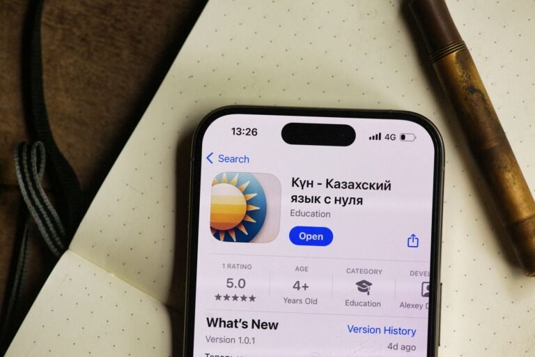 Patient leaving a Google review on a phone