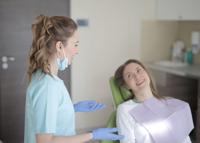 Dentist answering a patient's question during a consultation in Florida