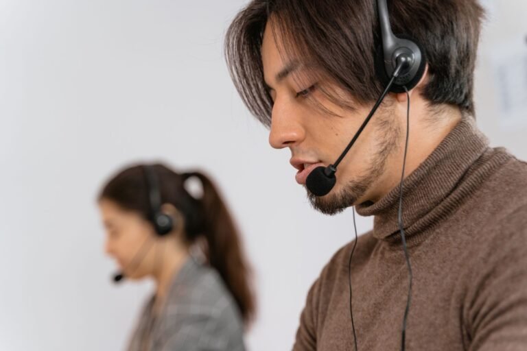 Customer service headset on a desk representing phone answering services
