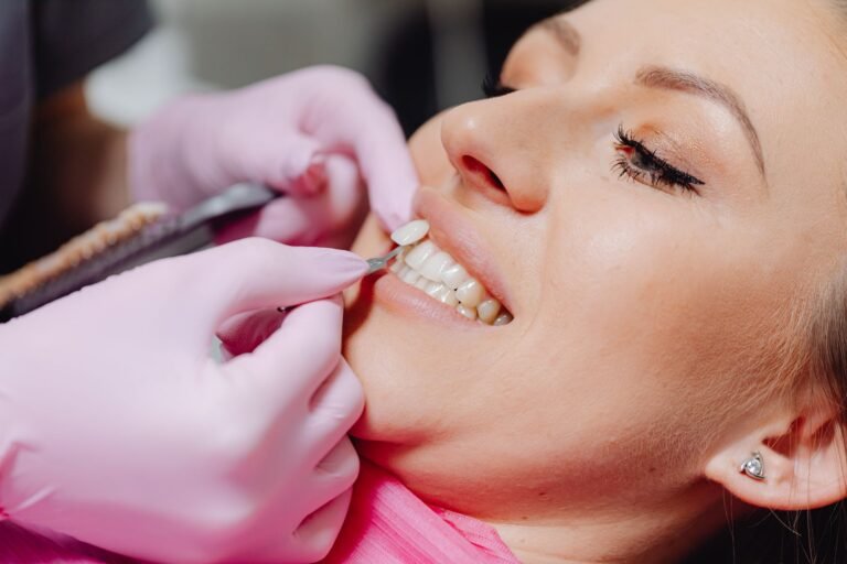 Cosmetic dental patient with a bright smile after veneers or whitening treatment