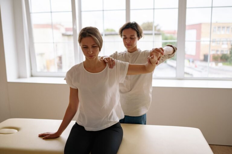 Physical therapist working with a patient in a Florida clinic