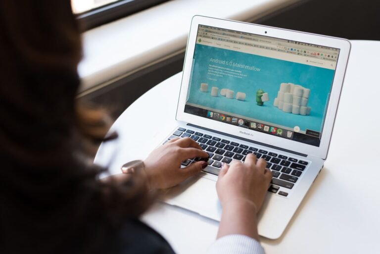 Physical therapy clinic website displayed on a laptop screen